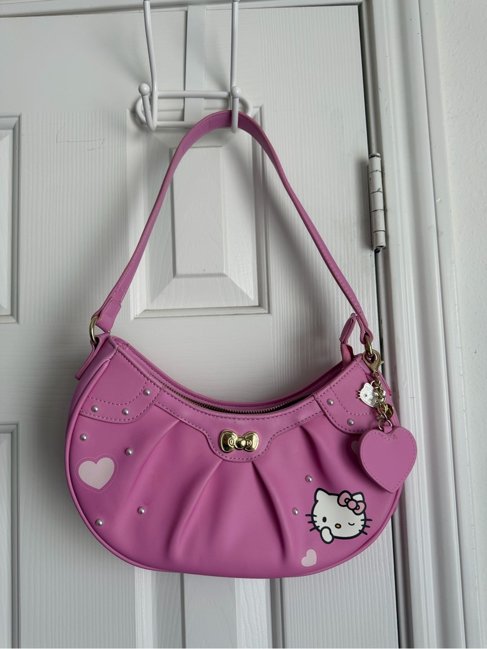 Hello Kitty Pink Crescent Shoulder Bag with Heart Charm